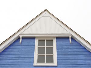 peak of house, blue with center window