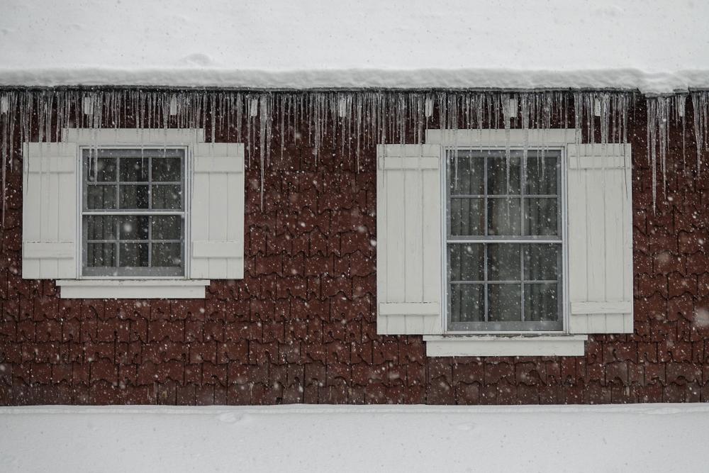 dangerous ice dam on house