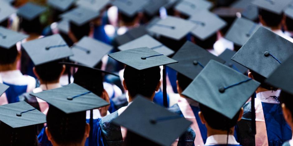 students wearing graduation caps