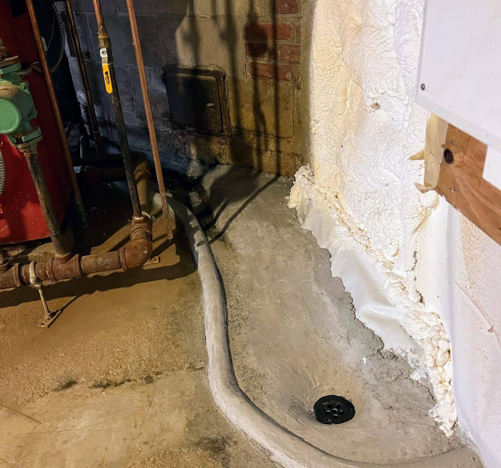 ehp_basement_waterproof_detail_swale_behind_furnance_drainage_vapor_and_insulation_sept_2024_0 Waterproof Basement with Spray Foam