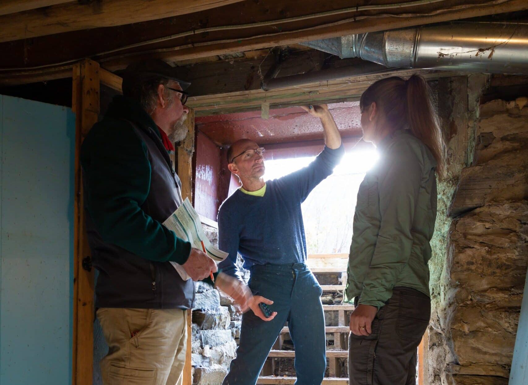 Evergreen Belfast Evergreen team going through basement
