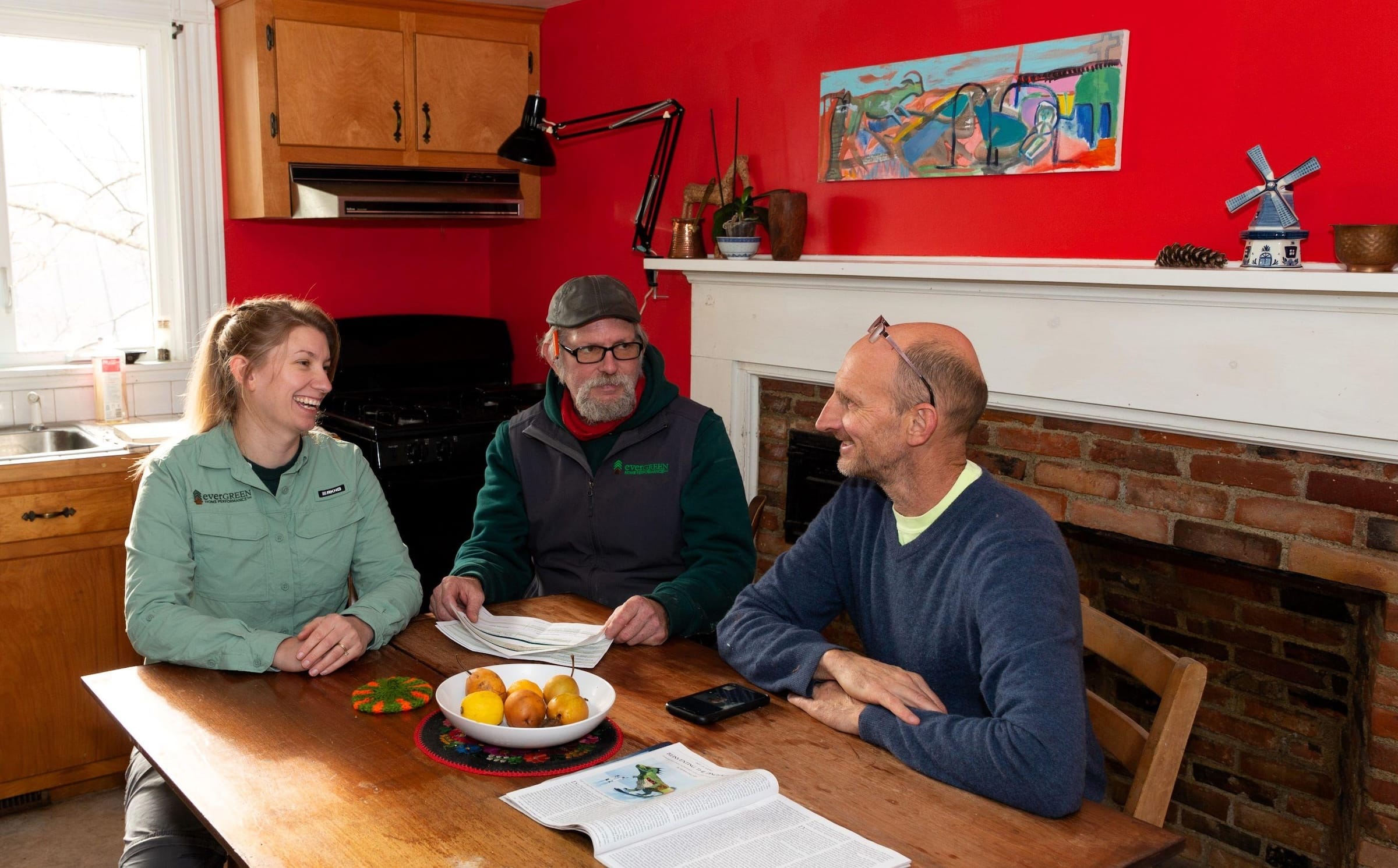 Evergreen team sitting down with customer at a table