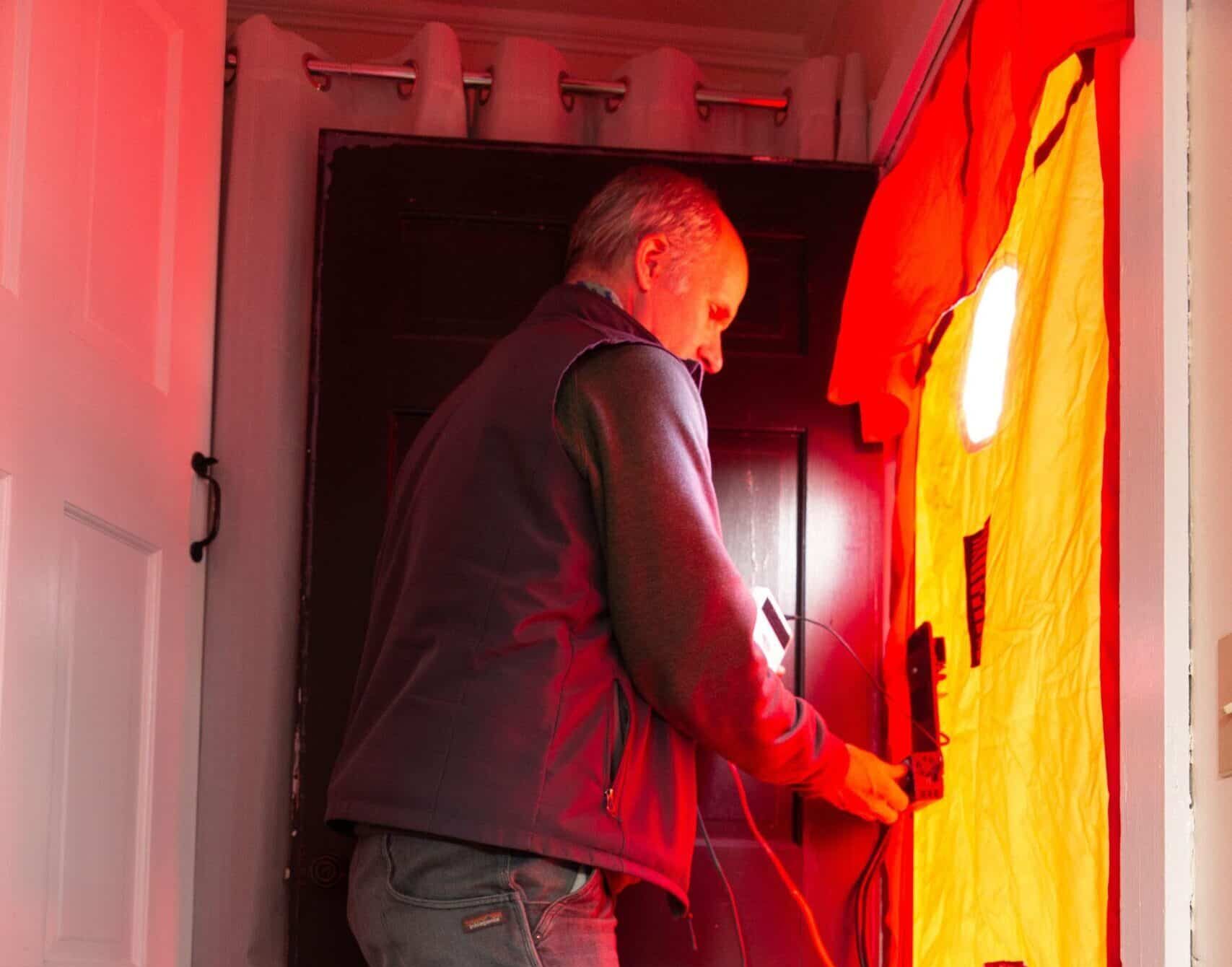 evergreen_blower_door_testing_setup_sm (1) Evergreen Team Conducting A Blower Door Test
