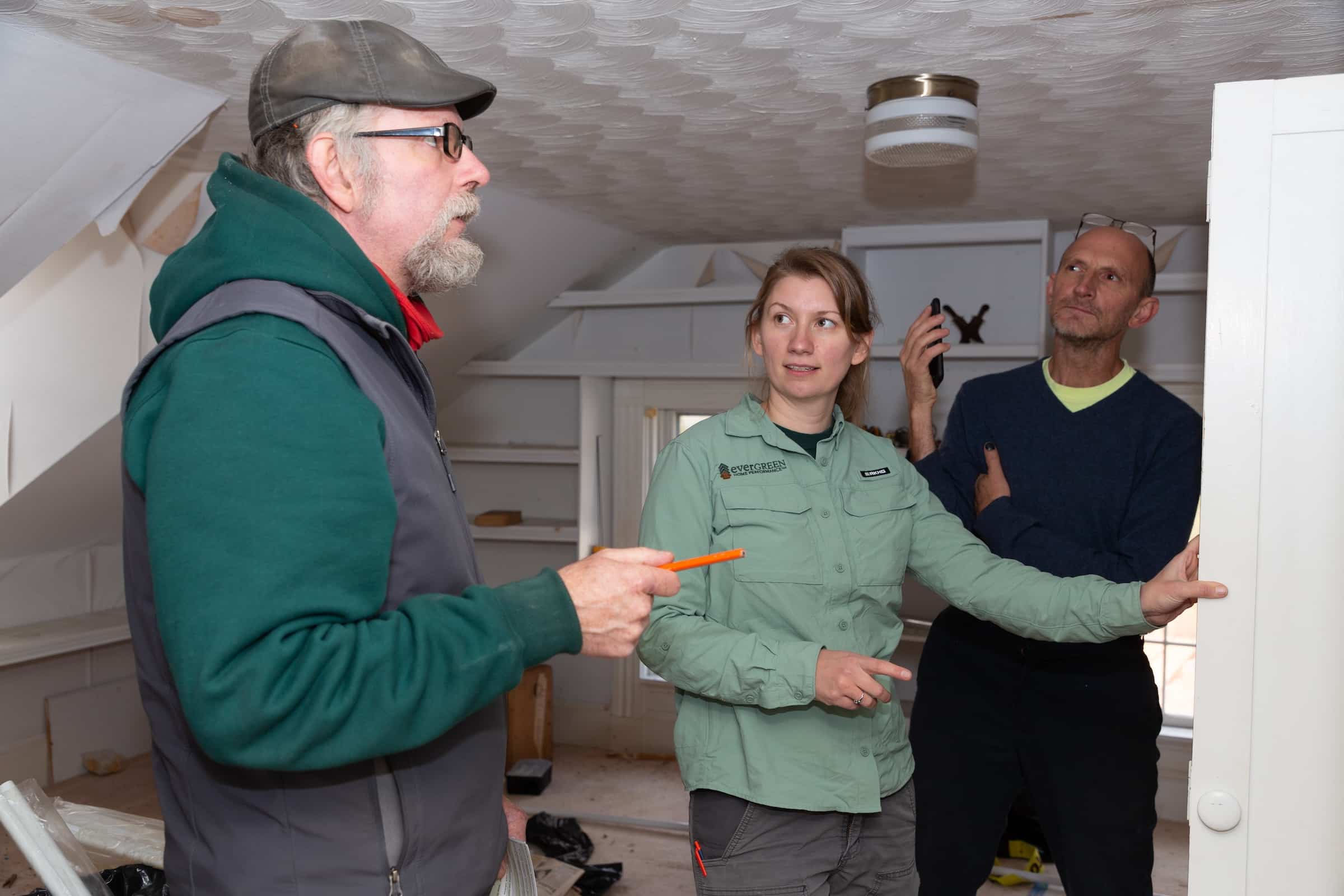 Evergreen team walking through a house